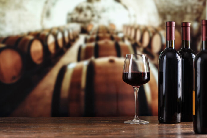 Wine cellar with wine bottle and glasses.
